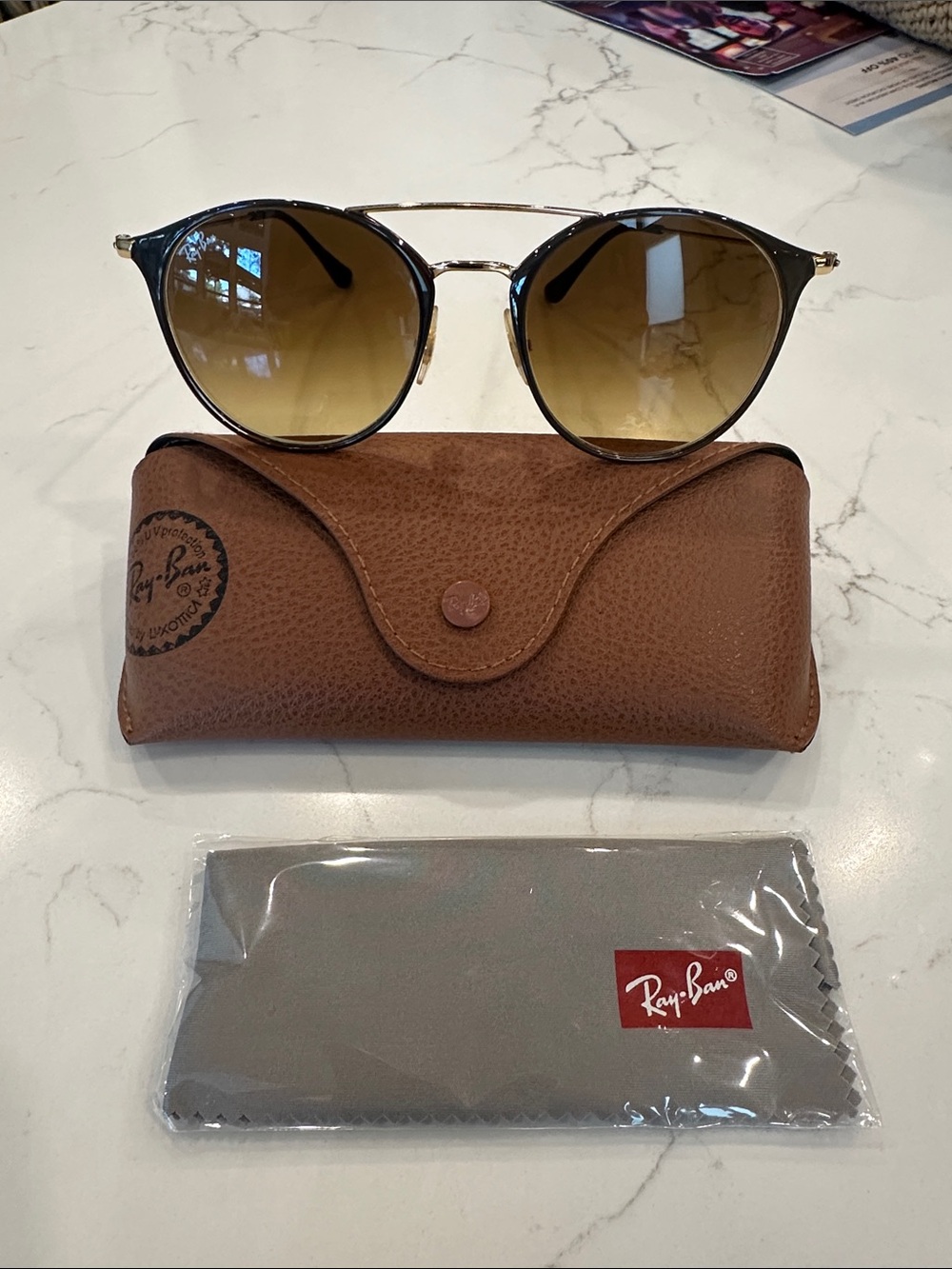 Ray-Ban Women’s Gold Frame Brown Lens Round Sunglasses